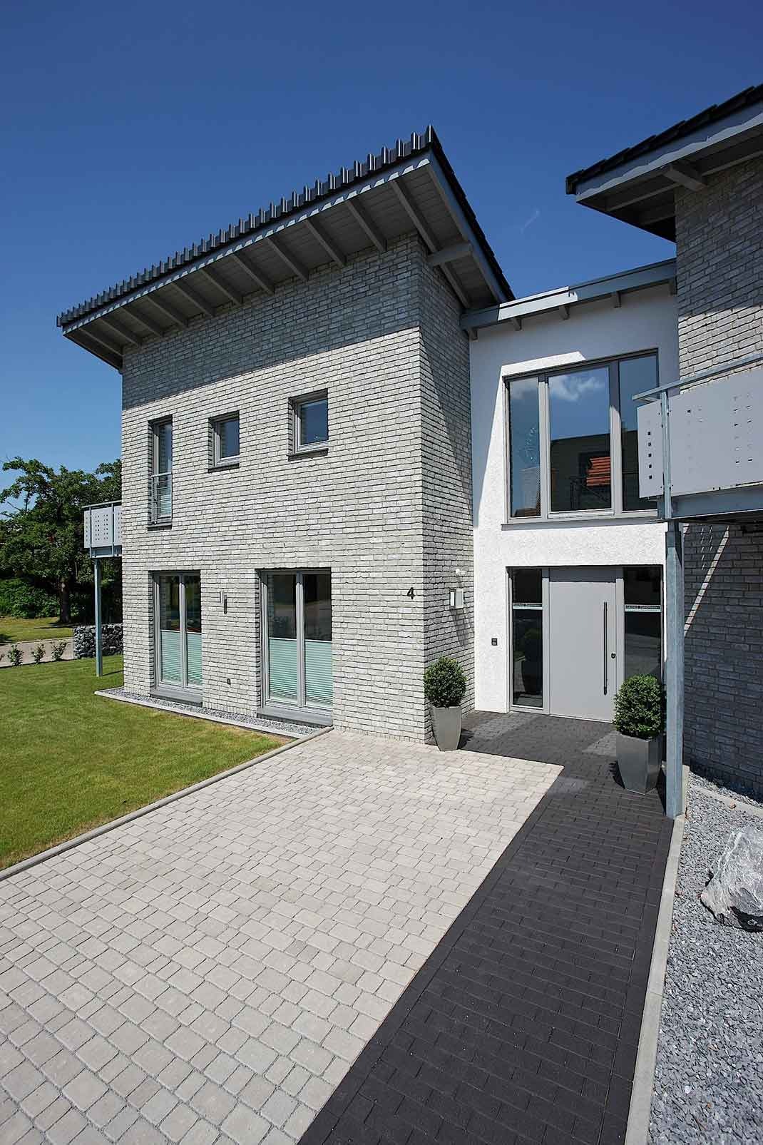 A white brick residential building